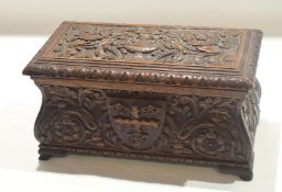 Carved oak rectangular box applied at the front with an armorial depicting the arms of Colchester