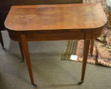 Regency period rosewood and satinwood banded D-shaped card table^ raised on tapering square supports