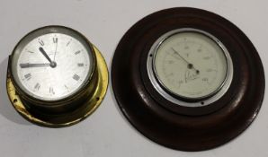 Small circular faced ship~s clock and a further mahogany cased barometer by The British Rotofirm Co^