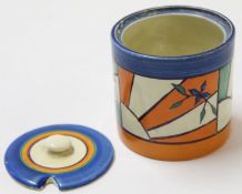 Clarice Cliff Fantasque Bizarre jam pot and cover with a sunburst type pattern with blue cover^