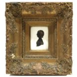 W Seville (19th century), Profile of a young girl, cut silhouette with gold highlights, 8 x 6cm