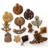 Quantity of 20th century cap badges to include Durham Light Infantry, Royal Artillery,