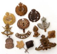 Quantity of 20th century cap badges to include Durham Light Infantry, Royal Artillery,