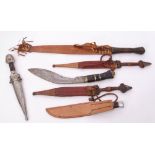 Group of six knives to include a Russian Caucasian Kinjal dagger with silver plate, wood and horn