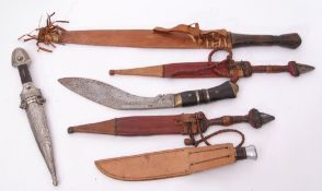 Group of six knives to include a Russian Caucasian Kinjal dagger with silver plate, wood and horn