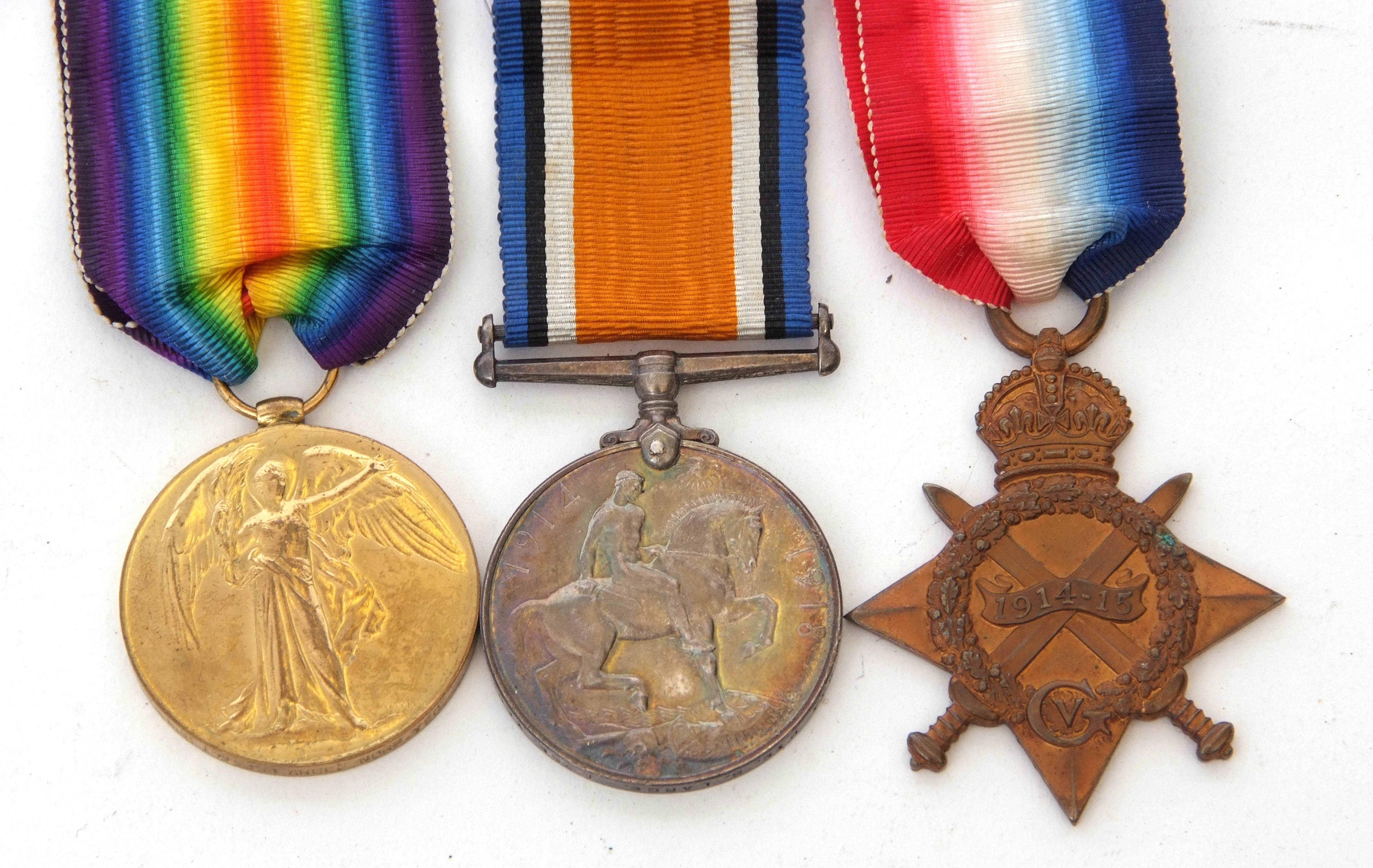 WWI medal trio comprising 1914-15 Star, War Medal and Victory Medal impressed to 833 Pte S Large