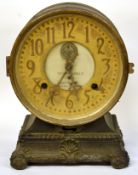 Fattorini & Sons late 19th century automatic 8-day alarm clock in circular brass case, complete with