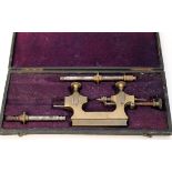 Late 19th century cased Tour a Pivoter watchmaker's tool in velvet lined box, the box 28cm