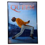 Framed poster of Freddie Mercury. Note: sold on behalf of a local charity