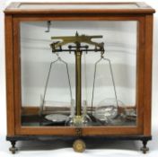 Set of weighing scales in wooden case