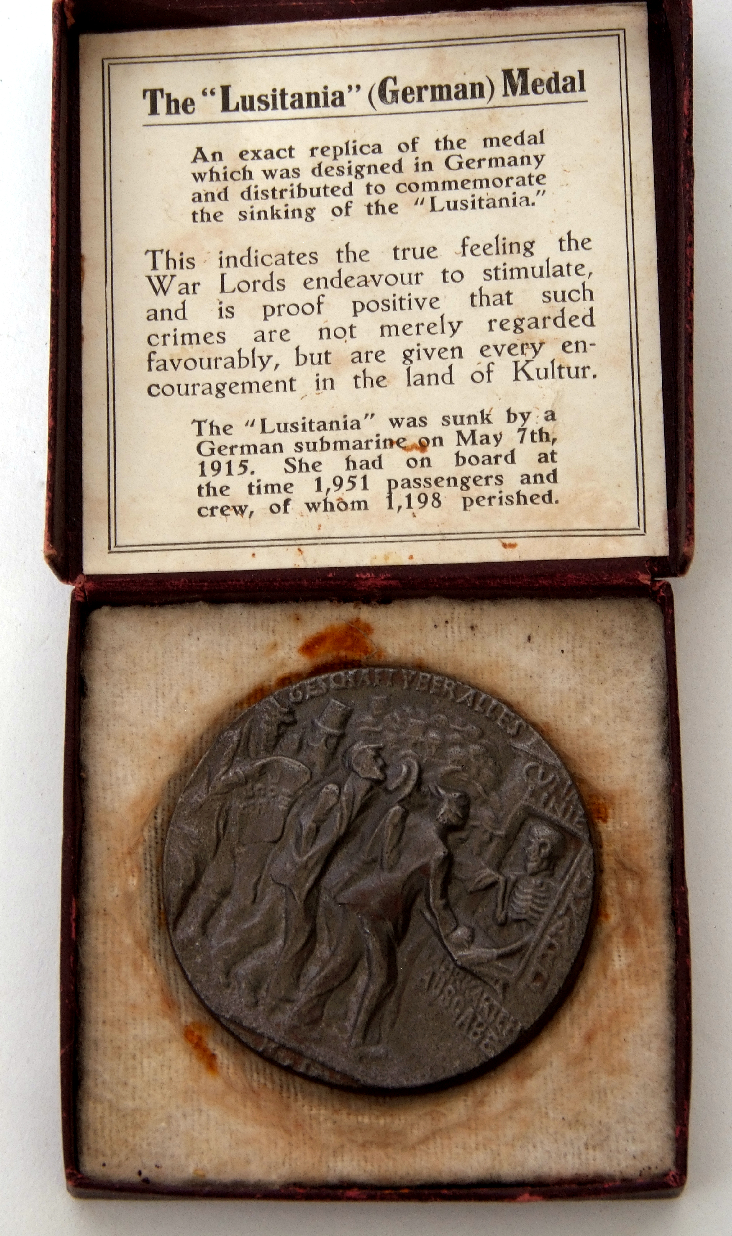 Exact replica of a German Lusitania medal with paperwork and associated cardboard box. Note: - Image 3 of 4