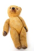 Early 20th century teddy bear with glass eyes