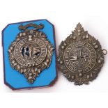 Pair of Argyll & Sutherland cap badges to include one with 1st Volunteer Btn to base