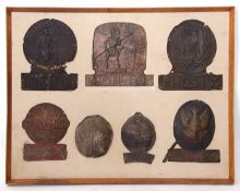 Mounted collection of fire marks including Union mark for Norwich, one for Phoenix Protection No