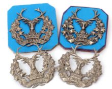 Group of four Gordon Highlanders Glengarry cap badges, white metal (4)