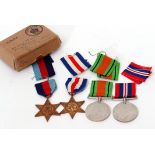 WWII British Medal group of four in original box to include 1939-45 Star, France & Germany Star,