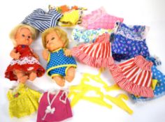 Collection of vintage doll's clothing with Sweet April carry case wardrobe and 2 dolls