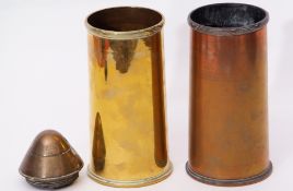 Pair of WWI 18 pounder shell casings/trench art vases, together with further German shell fuse