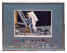 Photo of the Moon landing with a selection of stamps to commemorate the Apollo mission