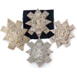 Four Royal Highlander Black Watch Glengarry cap badges (4)