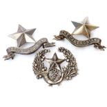Quantity of three Scottish Glengarry cap badges to include Cameronian badges together with