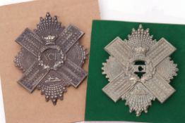 Pair of 92nd Gordon Highlander cap badges (2)