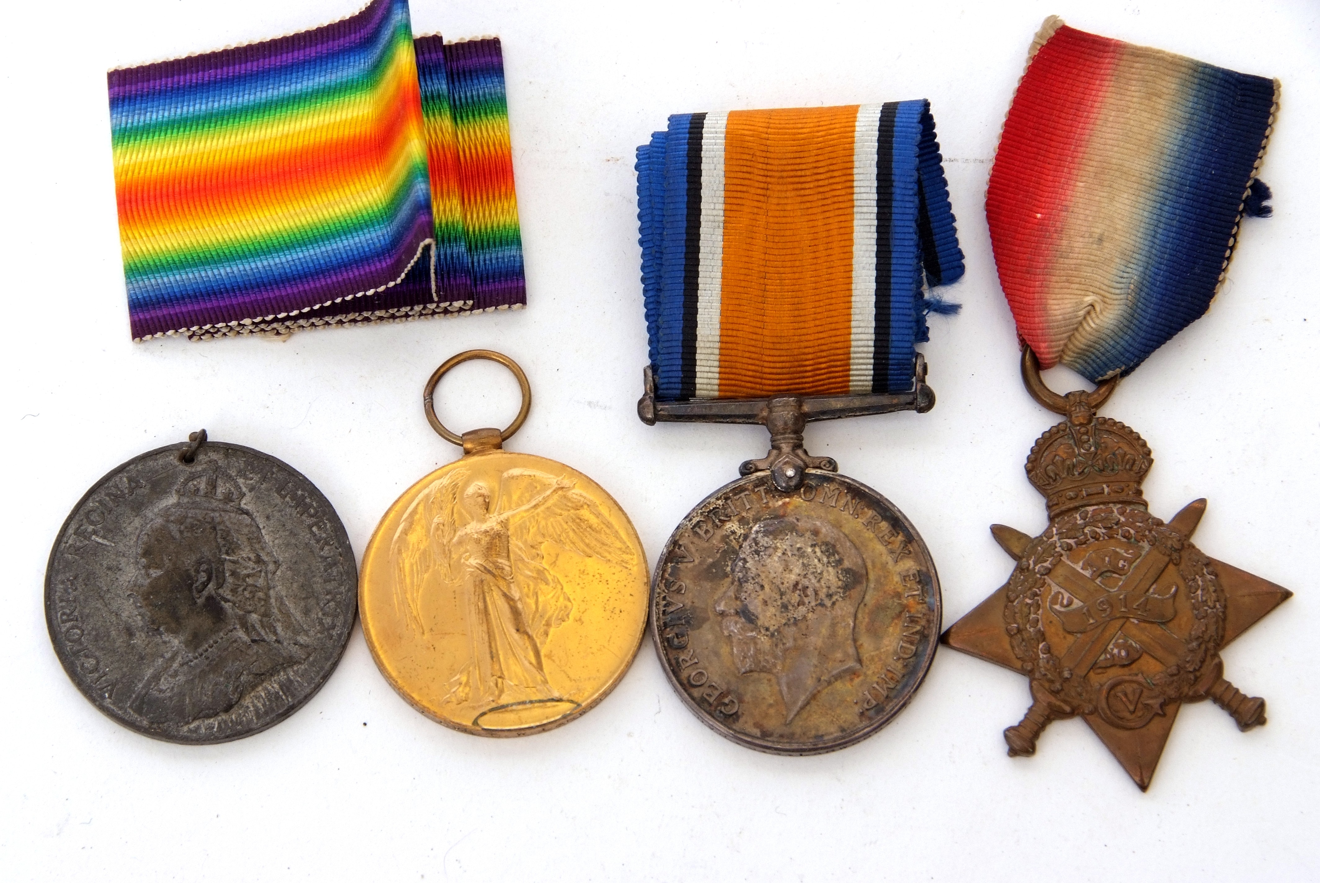 WWI medal trio comprising 1914-15 Star, War Medal and Victory Medal impressed to 38811 Dvr. G W