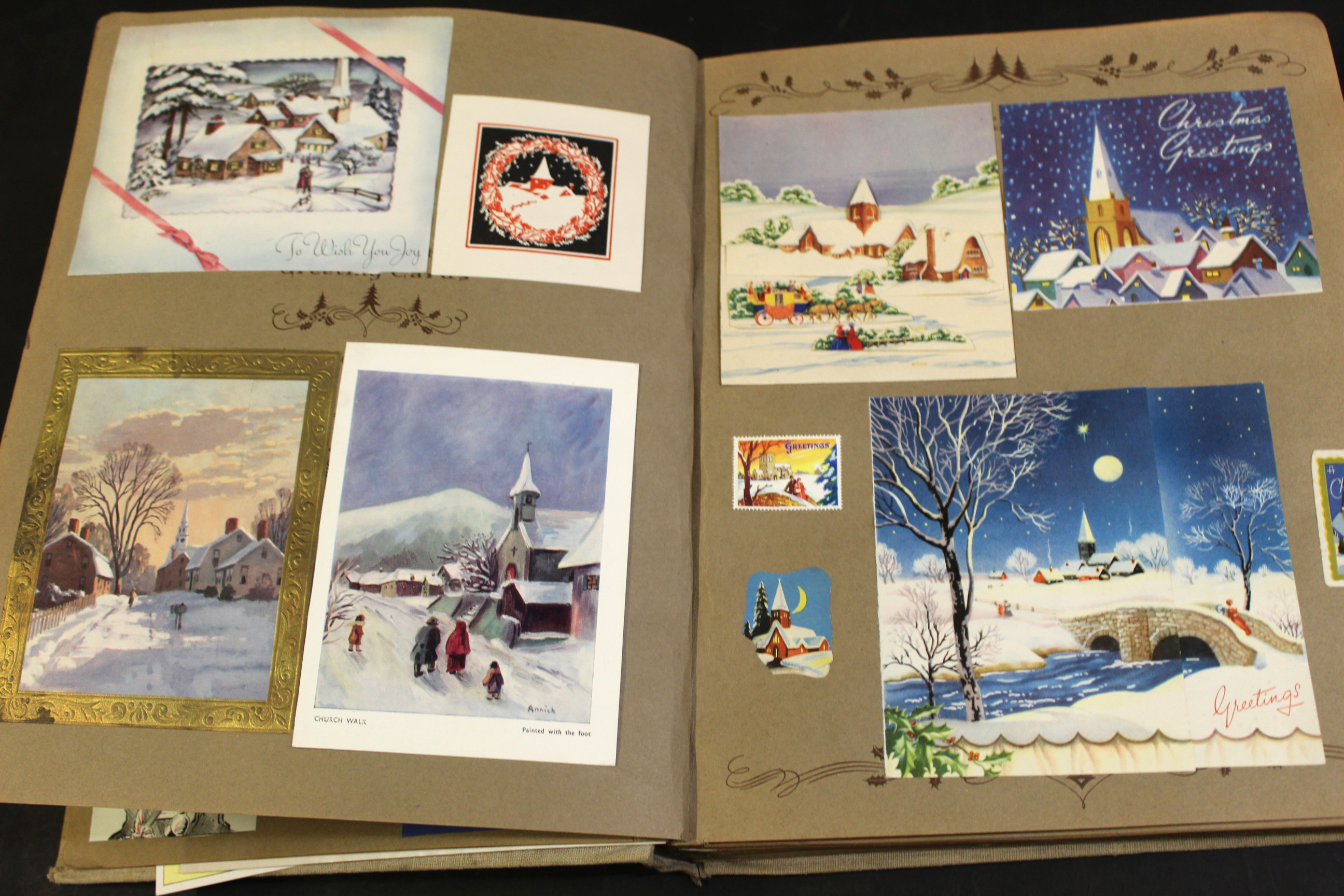 Mid-20th century scrap album with pages containing a number with Christmas themes, with various - Image 3 of 5