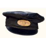 Railway man's cap with oval gilt badge "Engine Man SR"