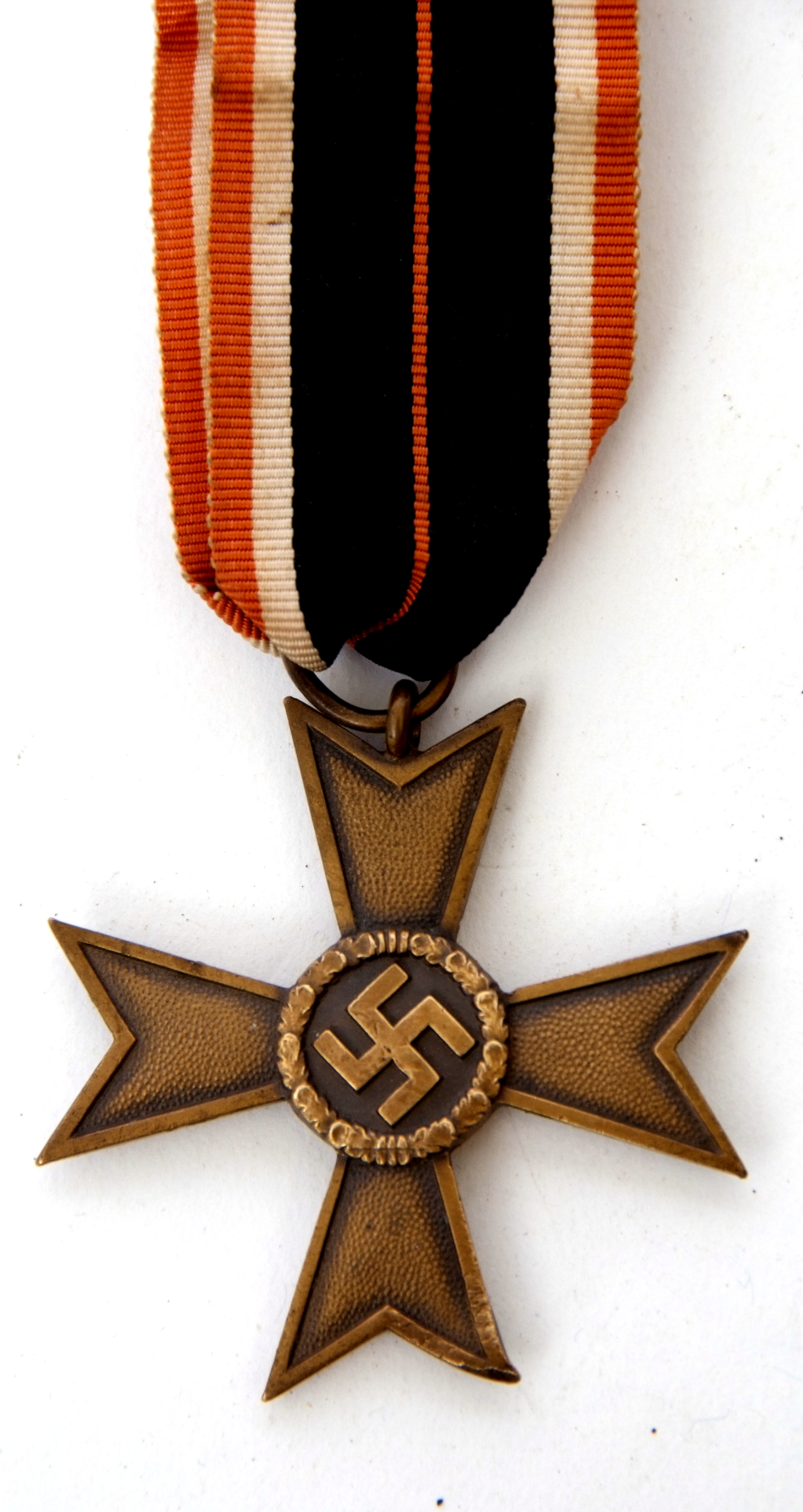 Third Reich German merit cross with civilian ribbon on suspension loop, (ribbon faded)