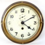 Ship's clock manufactured by Ivor C Weilbach, Solver & Svarrer, Copenhagen with circular dial and