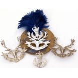 Pair of Seaforth & Cameron Highlanders cap badges, plus blue plume feather and Queen Elizabeth II