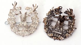 Pair of cast silver and white metal 3D Gordon Highlanders cap badges, one marked 925 AFC silver, the