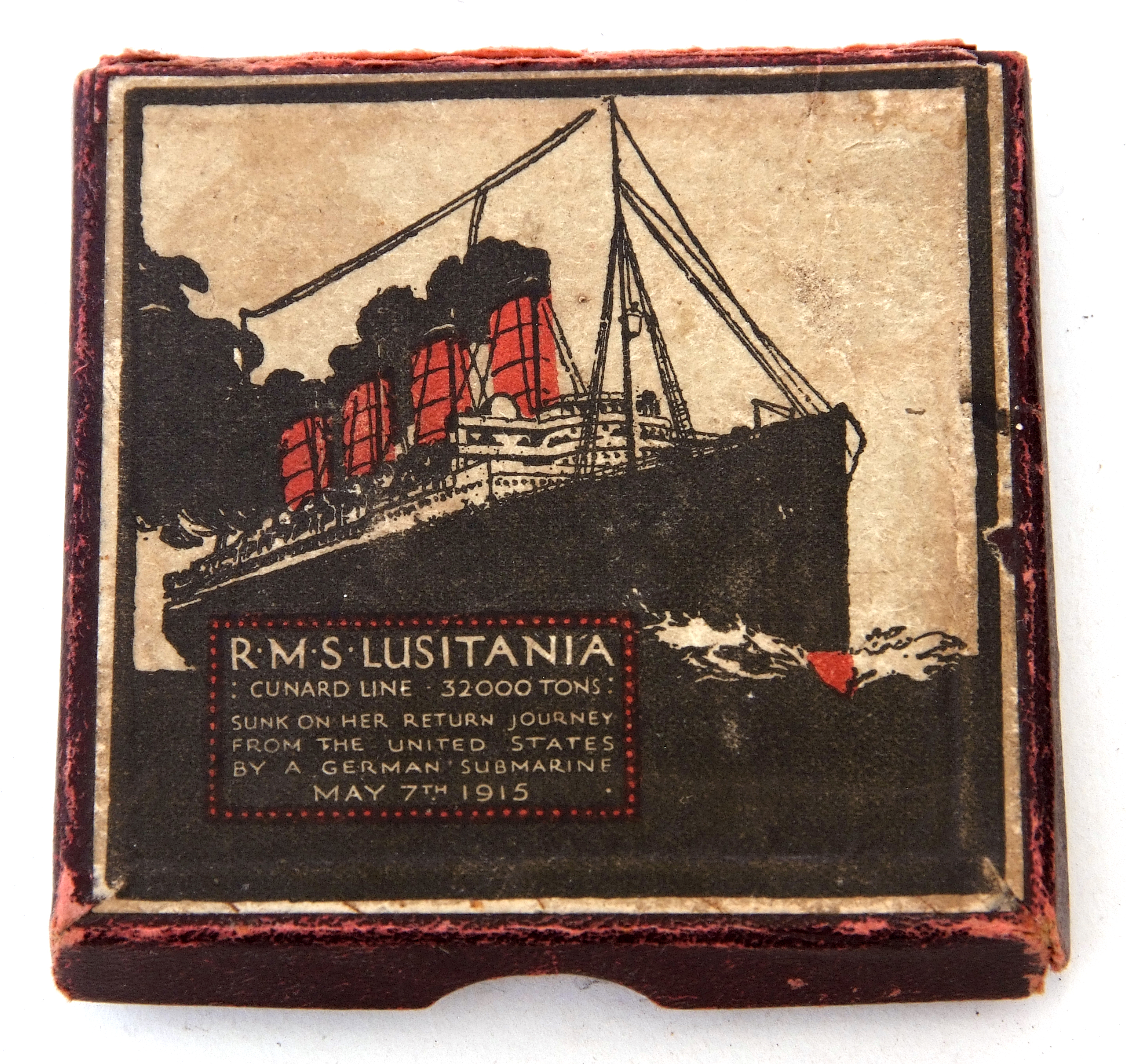 Exact replica of a German Lusitania medal with paperwork and associated cardboard box. Note: