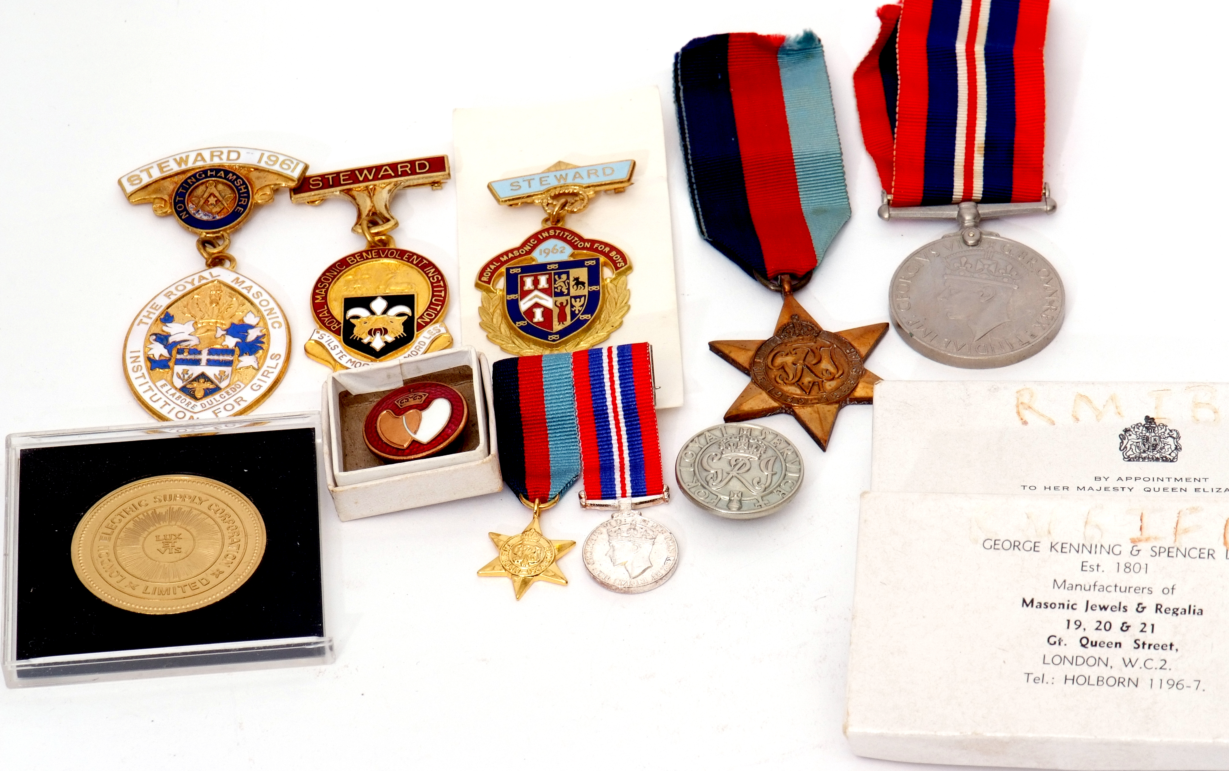 Pair of WWII British campaign medals to include 1939-45 Star, 1939-45 War medal, plus buttonhole