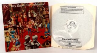 "Do They Know Its Christmas"/ "Feed The World" Band Aid LP, signed by Midge Ure together with a