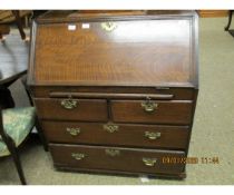 18TH CENTURY OAK BUREAU, APPLIED WITH A LATER GALLERIED TOP OVER FALL FRONT ENCLOSING FITTED