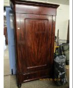 BIEDERMEIER STYLE MAHOGANY HALL WARDROBE WITH MOULDED CORNICE OVER PANELLED DOOR AND SINGLE DRAWER