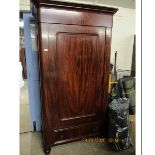 BIEDERMEIER STYLE MAHOGANY HALL WARDROBE WITH MOULDED CORNICE OVER PANELLED DOOR AND SINGLE DRAWER