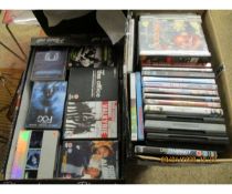 TWO BOXES OF MIXED DVDS ETC