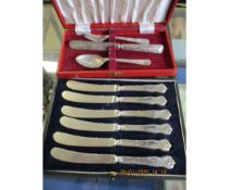 CASED SILVER CHRISTENING SET TOGETHER WITH A FURTHER CASED SET OF SILVER HANDLED BUTTER KNIVES (2)