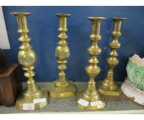 TWO PAIRS OF BRASS CANDLESTICKS