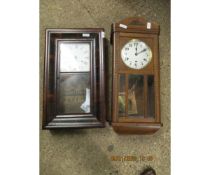 AMERICAN WALNUT FRAMED WALL CLOCK WITH ENAMELLED DIAL TOGETHER WITH A FURTHER OAK FRAMED WALL