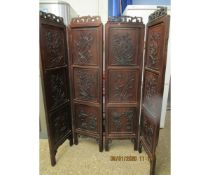 EARLY 20TH CENTURY FOUR SECTIONAL ORIENTAL HARDWOOD SCREEN WITH CARVED PANELS