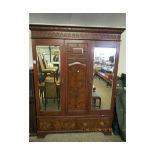 EDWARDIAN WALNUT WARDROBE WITH TWO MIRRORED DOORS WITH TWO DRAWER BASE WITH PANELLED DETAIL