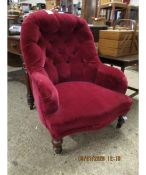 RED DRALON UPHOLSTERED NURSING CHAIR WITH MAHOGANY TURNED LEGS AND PORCELAIN CASTERS