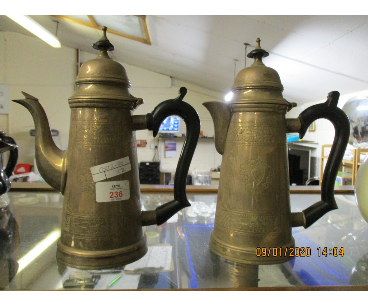 PAIR OF SILVERED AND EBONISED HANDLE COFFEE POTS WITH ETCHED DETAIL