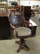 BENTWOOD FRAMED BARBERS CHAIR WITH REXINE UPHOLSTERED SEAT AND ADJUSTABLE HEAD REST ON A SWIVEL BASE