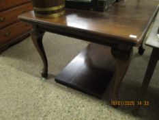 MAHOGANY FRAMED EXTENDING DINING TABLE WITH ONE EXTRA LEAF RAISED ON PAD FEET