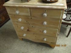 WAXED PINE TWO OVER THREE FULL WIDTH DRAWER CHEST WITH TURNED KNOB HANDLES